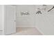 Bright walk-in closet with a carpeted floor and wire shelving providing ample storage space at 92 Sheryl Way, Loganville, GA 30052