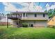 Backyard view with deck at 1214 Tyne Way, Stone Mountain, GA 30088