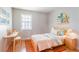 bedroom with a bed, desk, shelves, and colorful decor at 1214 Tyne Way, Stone Mountain, GA 30088