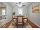 Dining room shows wood floor and space for a table at 1214 Tyne Way, Stone Mountain, GA 30088