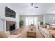 Cozy living room with fireplace, modern furniture, and natural light at 1214 Tyne Way, Stone Mountain, GA 30088