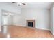 Bright living room featuring a fireplace and access to the backyard at 1214 Tyne Way, Stone Mountain, GA 30088