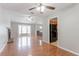 Open-concept living room features hardwood floors, fireplace, and natural light at 1214 Tyne Way, Stone Mountain, GA 30088