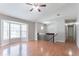 Spacious living room with hardwood floors and a staircase to the upper level at 1214 Tyne Way, Stone Mountain, GA 30088