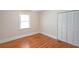 Bedroom features a closet and wood floor at 2055 Anderson Se Dr, Smyrna, GA 30080