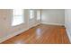 Bright living room features hardwood flooring and neutral wall colors at 2055 Anderson Se Dr, Smyrna, GA 30080