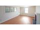Cozy living room with natural light and wood-look flooring at 2055 Anderson Se Dr, Smyrna, GA 30080