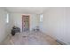 A large room with white wooden walls and a large glass door at 2055 Anderson Se Dr, Smyrna, GA 30080