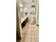 Neutral tiled bathroom featuring a vanity and modern accessories at 4846 Twin Lakes Trl, Atlanta, GA 30360