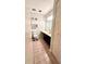 Well-lit bathroom featuring vanity, toilet, shelving, and neutral colors at 4846 Twin Lakes Trl, Atlanta, GA 30360