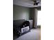 Cozy bedroom featuring a crib, dresser, and a window with natural light at 4846 Twin Lakes Trl, Atlanta, GA 30360