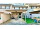 Townhome exterior with covered parking and lovely landscaping features at 4846 Twin Lakes Trl, Atlanta, GA 30360