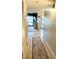 Inviting hallway with tile flooring and a stylish rug, leading towards the door at 4846 Twin Lakes Trl, Atlanta, GA 30360
