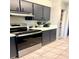 Well-equipped kitchen featuring stainless steel appliances and dark cabinets at 4846 Twin Lakes Trl, Atlanta, GA 30360