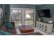 Comfortable living room with large windows, plush seating, and a stylish entertainment center, perfect for relaxation at 4846 Twin Lakes Trl, Atlanta, GA 30360