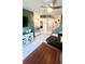 Open-concept living room with views to dining area and staircase at 4846 Twin Lakes Trl, Atlanta, GA 30360