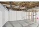 Unfinished basement showing exposed utilities, framed walls, and concrete flooring offers potential living space at 5276 Beechwood Ct, Marietta, GA 30068