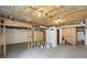 Unfinished basement featuring exposed ceiling joists and concrete flooring ready for customization at 5276 Beechwood Ct, Marietta, GA 30068