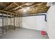 Unfinished basement with exposed ceiling, concrete floor, and ample space at 5276 Beechwood Ct, Marietta, GA 30068