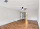Spacious bedroom with hardwood floors, a ceiling fan, and ample natural light at 5276 Beechwood Ct, Marietta, GA 30068