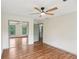 Bedroom with hardwood floors, closet with mirrored doors and a doorway to another room at 5276 Beechwood Ct, Marietta, GA 30068