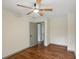 Bedroom with hardwood floors, ceiling fan, a closet and a view to another room at 5276 Beechwood Ct, Marietta, GA 30068