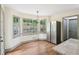 Bright breakfast nook with a view of the backyard, stainless appliances and wood floors at 5276 Beechwood Ct, Marietta, GA 30068