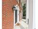 Charming entryway with a stylish black front door, decorative sidelights, and a welcoming 'hello' doormat at 5276 Beechwood Ct, Marietta, GA 30068
