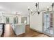 Stylish kitchen features an island with granite countertops and stainless appliances at 5276 Beechwood Ct, Marietta, GA 30068
