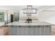 Modern kitchen features white cabinets, granite countertops, and stainless appliances at 5276 Beechwood Ct, Marietta, GA 30068