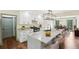 Bright kitchen with stainless appliances, granite counters, eat in bar and open to a dining room with a view at 5276 Beechwood Ct, Marietta, GA 30068