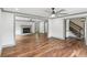 Spacious living room featuring hardwood floors, fireplace, and open floor plan at 5276 Beechwood Ct, Marietta, GA 30068