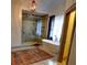 Luxurious bathroom features marble shower, soaking tub, and stylish fixtures at 1178 Chambord Ne Way, Brookhaven, GA 30319