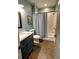 Bathroom with granite counters, shower, and tile flooring at 1178 Chambord Ne Way, Brookhaven, GA 30319