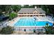 Large swimming pool with a slide and many lounge chairs in the community at 1178 Chambord Ne Way, Brookhaven, GA 30319