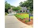 Stately home with a well-manicured lawn, mature trees, and a charming mailbox enhancing curb appeal at 1178 Chambord Ne Way, Brookhaven, GA 30319