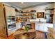 Dining area with adjacent open concept kitchen offers seamless flow with open to the living areas at 1178 Chambord Ne Way, Brookhaven, GA 30319