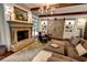 Cozy living room with fireplace, barn doors, decor, and plush seating at 1178 Chambord Ne Way, Brookhaven, GA 30319