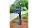 Classic black mailbox with decorative details adding character and charm to the property's entrance at 1178 Chambord Ne Way, Brookhaven, GA 30319