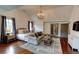 Well appointed bedroom featuring sitting area with decorative rug, and chandelier at 1178 Chambord Ne Way, Brookhaven, GA 30319