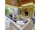 Cozy outdoor living space featuring a stone fireplace, comfortable seating, and a relaxing atmosphere at 1178 Chambord Ne Way, Brookhaven, GA 30319