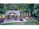 Charming open-air pavilion with picnic tables and landscaped walkway provides a peaceful retreat at 1178 Chambord Ne Way, Brookhaven, GA 30319