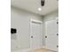 Bedroom with light wood floors and white trim around doors and baseboards at 3821 Chamblee Dunwoody Rd, Atlanta, GA 30341