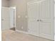 Bedroom with a closet and a doorway leading to another room at 3821 Chamblee Dunwoody Rd, Atlanta, GA 30341