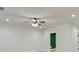 Bright living room with light wood floors, recessed lighting and a modern ceiling fan at 3821 Chamblee Dunwoody Rd, Atlanta, GA 30341
