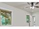 Bright living room with light wood floors and a view of an outdoor staircase through a window at 3821 Chamblee Dunwoody Rd, Atlanta, GA 30341