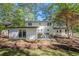 Expansive backyard featuring a patio area with outdoor seating, perfect for entertaining guests at 4446 Huntington Cir, Atlanta, GA 30338