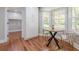 Bright dining area with bay window, hardwood floors, and seating for two at 4446 Huntington Cir, Atlanta, GA 30338