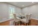 Sunlit dining room with hardwood floors at 4446 Huntington Cir, Atlanta, GA 30338