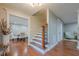 Inviting foyer with hardwood floors, elegant trim, and a staircase to the upper level at 4446 Huntington Cir, Atlanta, GA 30338